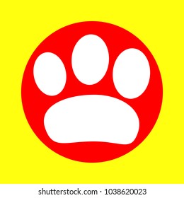 Paw icon. Veterinary or pet shop emblem. Vector. White flat icon inside red circle at yellow background. Isolated.