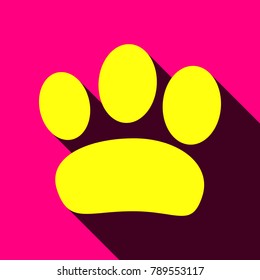 Paw icon. Veterinary or pet shop emblem. Vector. Flat yellow icon with with semitransparent shadow on rose background.