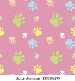 Paw pattern, seamless vector pattern silhouettes of paw, cat's feet, dog's footprint. Multicolor on pink background