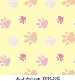 Paw pattern, seamless vector pattern silhouettes of paw, cat's feet, dog's footprint. Multicolor on yellow background