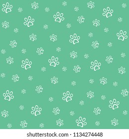 Paw print icon seamless pattern, green vector illustration