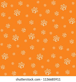 Paw print icon seamless pattern, orange vector illustration