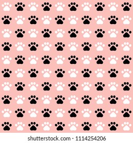 Paw print seamless pattern. Black and white pawprint on rosy background. Design for textile, wallpaper, fabric. Pet care symbol. Repeat ornament.