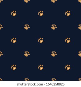 Paw print seamless pattern. Pawprint with heart in light brown color on  dark blue background. Design for textile, wallpaper, fabric, wrapping, scrap, gift paper. Pet care symbol. Vector repeat orname