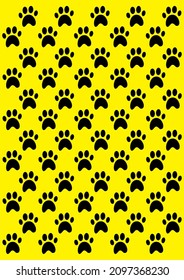 Paw print seamless pattern. Traces of Dog Pattern. Black silhouette on yellow background.  Vector.