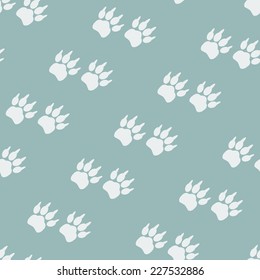 Paw prints. Seamless background. EPS Vector illustration
