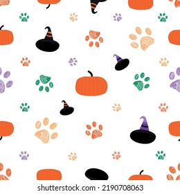 Paw prints and witch hat. Happy Halloween card and fabric design seamless pattern