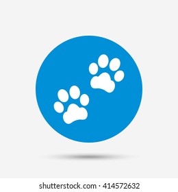 Paw sign icon. Dog pets steps symbol. Blue circle button with icon. Vector