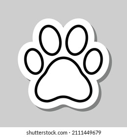 Paw simple icon. Flat desing. Sticker with shadow on gray background.ai