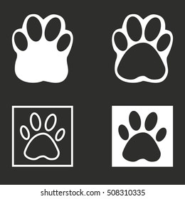 Paw vector icon. White illustration isolated on black background for graphic and web design.