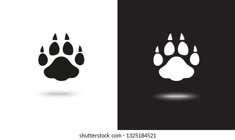 paw vector icons on black and white background
