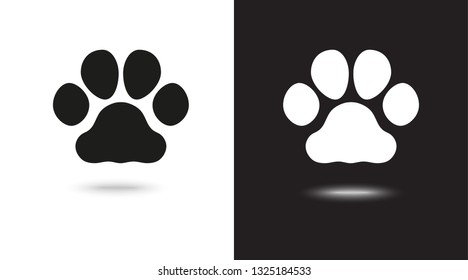 paw vector icons on black and white background