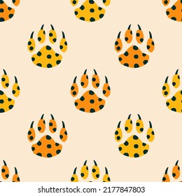 Paws of African leopards hand drawn vector illustration. Colorful safari animal seamless pattern for kids fabric or wallpaper.