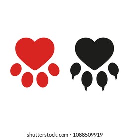 paws of a dog in the shape of a heart on a white background