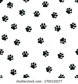 Paws of a dog traces. Vector black-and-white illustration. Black stamps on white background. Seamless pattern. For logo, wallpaper, fabric, packing, wrapper, scrapbooking, digital paper