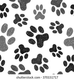 Paws print seamless pattern. Vector background with doodle dogs paws. 