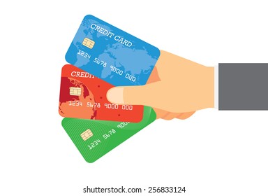 Pay three credit card in one hand over isolated background