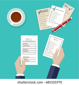 Paying bills. Bill in hand. Payment of utility, bank, restaurant and other.