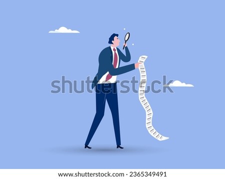 Paying bills, cost and expense analysis for business or personal finance concept, smart businessman using magnifying glass to analyze budget, income tax or expense on long invoice receipt paper.