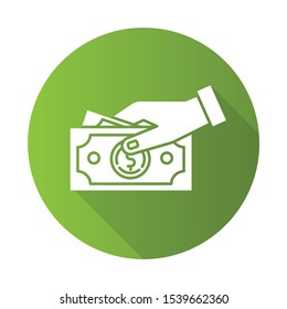 Payment by cash green flat design long shadow glyph icon. Hand holding dollars banknotes. Money turnover. Customer paying for products. Bribery and corruption. Vector silhouette illustration