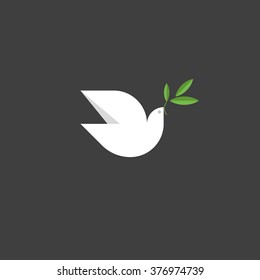 Peace dove with green branch. Flat design style vector illustration