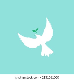 Peace and hope flying bird. White dove with green sprig.  Icon isolated on blue.  Peace, holiday, love vector symbol. International  Peace day sign. 