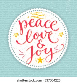 Peace, Love And Joy Text. Christmas Card With Custom Handwritten Type, Vector Point Pen Calligraphy. Red Phrase In Round Frame On Blue Knit Texture Background.