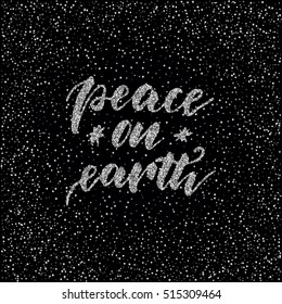 Peace on earth - ink freehand lettering with silver glitter texture. Modern brush calligraphy, isolated on the silver star shape confetti background.