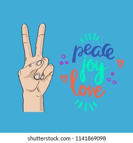 Peace sign hand. Hand written calligraphy phrase peace love joy. World peace day. Vector illustration.