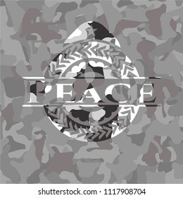 Peace written on a grey camouflage texture
