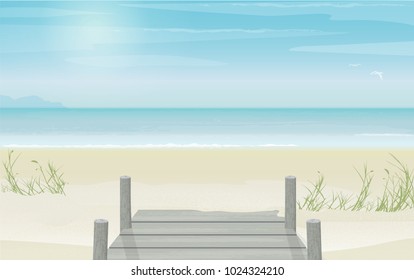 Peaceful and serene view of an empty beach landscape. Old pier and board walk entrance to the sandy beach. 