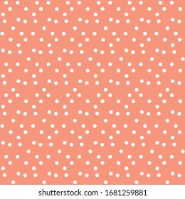 Peach colour background in white dots seamless pattern vector