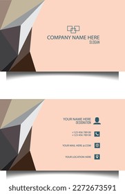 A peach pink colored business card with brown and gray color palette triangle pattern. 