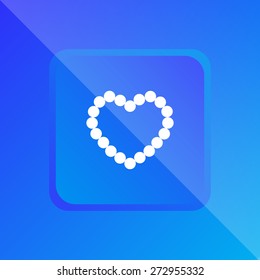 Pearl beads as heart on a white background
