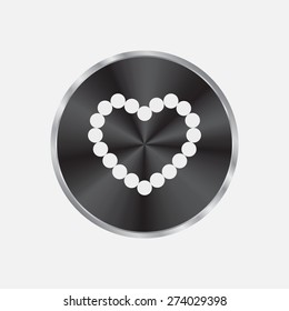 Pearl beads as heart on a white background