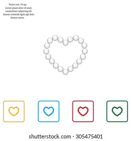 Pearl beads as heart on a white background