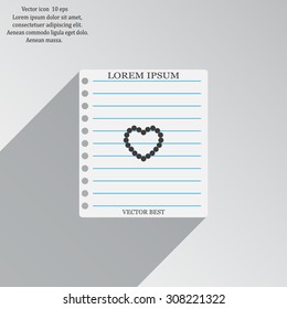 Pearl beads as heart on a white background