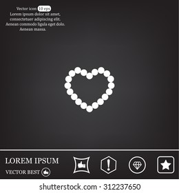 Pearl beads as heart on a white background