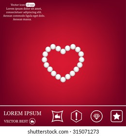 Pearl beads as heart on a white background