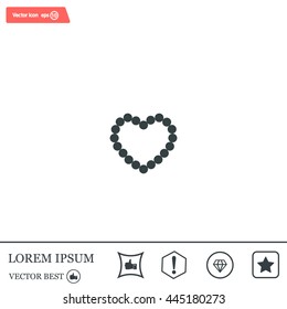 Pearl beads as heart on a white background
