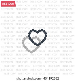 Pearl beads as heart on a white background