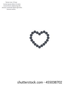 Pearl beads as heart on a white background
