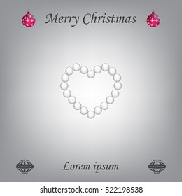 Pearl beads as heart on a white background