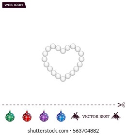 Pearl beads as heart on a white background