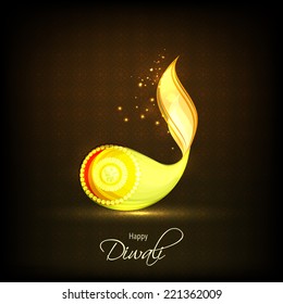 Pearl decorated illuminated oil lit lamp with stylish text of Diwali for Diwali celebration on shiny dark brown background.