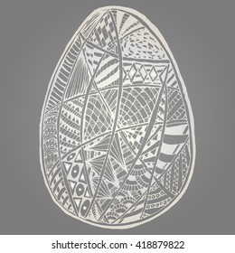 Pearl Easter Egg isolated zentangl pattern with lots of fine patterns of different forms in different sectors.