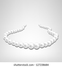 Pearl Necklace On Gray Background