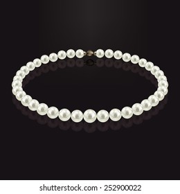 Pearl necklace with reflection on a dark background. With gold claps.