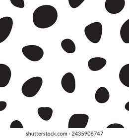 Pebble like black spots arranged in seamless vector pattern. Black stones repeated on white background. Subtle surface art for printing on various surfaces or usage in graphic design projects.