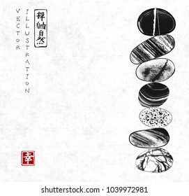 Pebble zen stones balance on rice paper background. Traditional Japanese ink painting sumi-e. Contains hieroglyphs - zen, freedom, nature